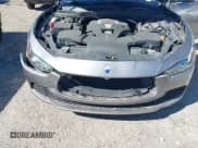 ✅ 2015 Maserati Ghibli • VIN: ZAM57XSA7F1131652 • Lot: 41560759. Listed on IAAI with 103,537 mi. Free auction sales archive from the USA and detailed vehicle history report at DreamBid. Image 6.