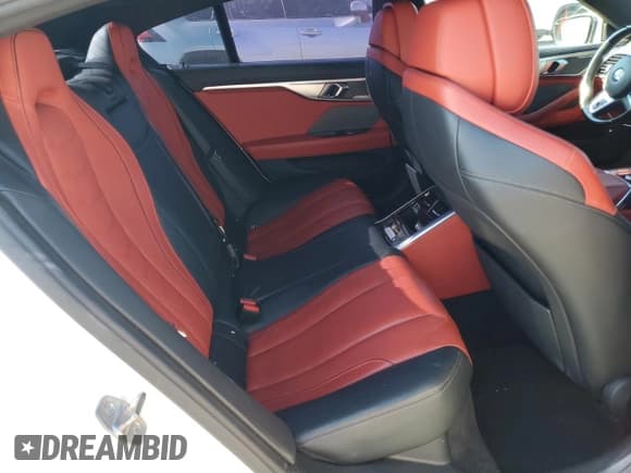 ✅ 2023 BMW 8 Series 840i • VIN: WBAGV2C04PCM45449 • Lot: 91686385. Listed on Copart with 29,887 mi. Free auction sales archive from the USA and detailed vehicle history report at DreamBid. Image 10.