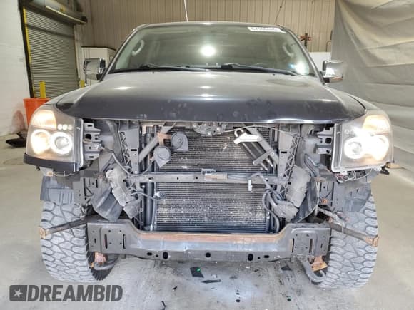 ✅ 2010 Nissan Titan SE • VIN: 1N6AA0EJ8AN318615 • Lot: 67966485. Listed on Copart with 120,411 mi. Free auction sales archive from the USA and detailed vehicle history report at DreamBid. Image 5.