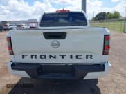 ✅ 2025 Nissan Frontier SL • VIN: 1N6ED1EJ8SN627484 • Лот: 43301769. Опубликован ранее на IAAI с пробегом 6 765 миль. Бесплатный доступ к архиву аукционных продаж из США и подробный отчёт об истории автомобиля на DreamBid. Изображение 17.