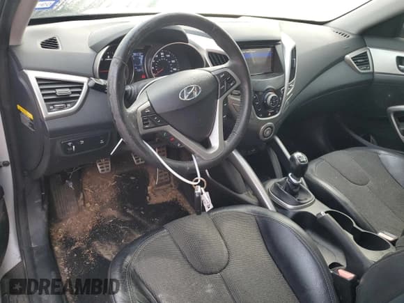 ✅ 2012 Hyundai Veloster w/Red Int • VIN: KMHTC6AD3CU022771 • Lot: 79606664. Wystawiony na Copart z przebiegiem 98 480 mil. Bezpłatny archiwum sprzedaży aukcyjnych z USA i szczegółowy raport historii pojazdu na DreamBid. Zdjęcie 8.