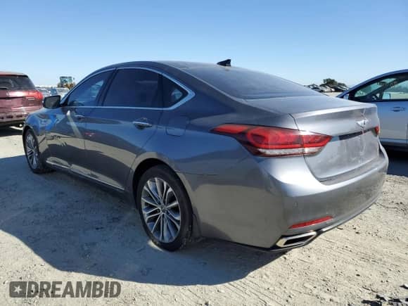 2015 Hyundai Genesis 3.8L z VIN KMHGN4JE2FU077886, wystawiony jako Copart lot #76945744 z przebiegiem 872 mil mil oraz Szkoda całkowita • Salvage title. Historia ofert i sprzedaży dostępna na DreamBid. Obrazek 2.