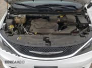 ✅ 2021 Chrysler Voyager LXi • VIN: 2C4RC1DG9MR505994 • Лот: 87031105. Опубликован ранее на Copart с пробегом 104 502 миль. Бесплатный доступ к архиву аукционных продаж из США и подробный отчёт об истории автомобиля на DreamBid. Изображение 12.