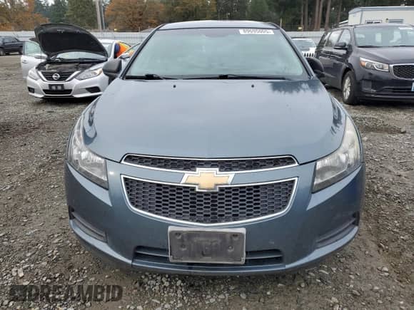 2012 Chevrolet Cruze LS z VIN 1G1PC5SH1C7250759, wystawiony jako Copart lot #89695005 z przebiegiem 207 599 mil mil oraz Szkoda całkowita • Salvage title. Historia ofert i sprzedaży dostępna na DreamBid. Obrazek 5.