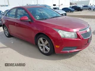 ✅ 2013 Chevrolet Cruze 2LT • VIN: 1G1PE5SB0D7134668 • Lot: 43476399. Listed on IAAI with 159,045 mi. Free auction sales archive from the USA and detailed vehicle history report at DreamBid. Image 1.