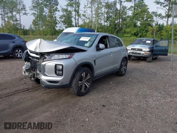 ✅ 2021 Mitsubishi Outlander ES • VIN: JA4ARUAU6MU020653 • Lot: 43406687. Listed on IAAI with 104,009 mi. Free auction sales archive from the USA and detailed vehicle history report at DreamBid. Image 2.