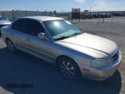 ✅ 2006 Kia Optima LX • VIN: KNAGD128565440980 • Lot: 42012751. Wystawiony na IAAI z przebiegiem 164 542 mil. Bezpłatny archiwum sprzedaży aukcyjnych z USA i szczegółowy raport historii pojazdu na DreamBid. Zdjęcie 1.