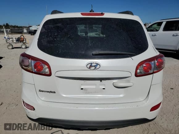 ✅ 2012 Hyundai Santa Fe GLS • VIN: 5XYZG3AB3CG100841 • Lot: 87966315. Listed on Copart with 215,253 mi. Free auction sales archive from the USA and detailed vehicle history report at DreamBid. Image 6.