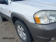 ✅ 2004 Mazda Tribute LX • VIN: 4F2CZ94154KM25671 • Lot: 41525470. Listed on IAAI with 206,805 mi. Free auction sales archive from the USA and detailed vehicle history report at DreamBid. Image 6.
