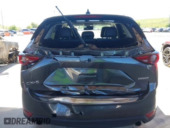 ✅ 2021 Mazda CX-5 Grand Touring • VIN: JM3KFADM9M1381655 • Lot: 43436750. Wystawiony na IAAI z przebiegiem 64 217 mil. Bezpłatny archiwum sprzedaży aukcyjnych z USA i szczegółowy raport historii pojazdu na DreamBid. Zdjęcie 6.