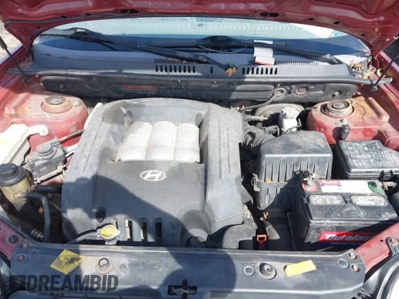 2005 Hyundai Santa Fe GLS z VIN KM8SC73D45U009304, wystawiony jako IAAI lot #41801704 z przebiegiem 140 419 mil mil oraz . Historia ofert i sprzedaży dostępna na DreamBid. Obrazek 10.