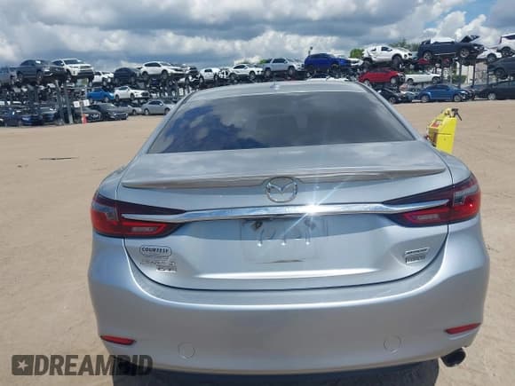✅ 2018 Mazda 6 Grand Touring • VIN: JM1GL1TY4J1318311 • Lot: 43240836. Listed on IAAI with 101,987 mi. Free auction sales archive from the USA and detailed vehicle history report at DreamBid. Image 17.