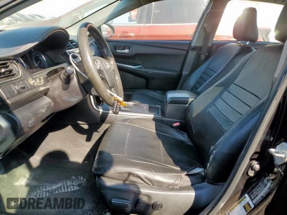 2015 Toyota Camry LE with VIN 4T1BD1FK9FU169152, listed as a Copart auction lot 82115885 with 319,570 mi miles and Salvage title. Bid and sale history available at DreamBid. Image 7.