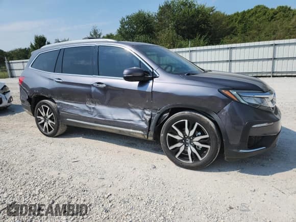 ✅ 2020 Honda Pilot Touring 7-Passenger • VIN: 5FNYF5H65LB000170 • Lot: 72038505. Listed on Copart with 70,676 mi. Free auction sales archive from the USA and detailed vehicle history report at DreamBid. Image 4.