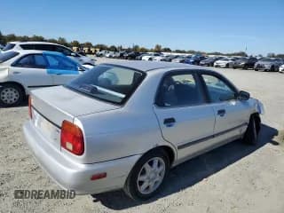 ✅ 2001 Suzuki Esteem GL • VIN: JS2GB41S215208522 • Lot: 90477065. Wystawiony na Copart z przebiegiem 105 291 mil. Bezpłatny archiwum sprzedaży aukcyjnych z USA i szczegółowy raport historii pojazdu na DreamBid. Zdjęcie 3.