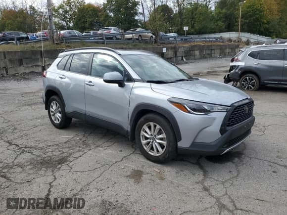 ✅ 2023 Toyota Corolla Cross LE • VIN: 7MUBAABG1PV067158 • Lot: 82475075. Listed on Copart with 34,950 mi. Free auction sales archive from the USA and detailed vehicle history report at DreamBid. Image 4.