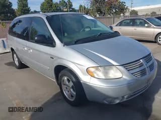 ✅ 2005 Dodge Caravan SXT • VIN: 2D4GP44L05R345986 • Lot: 43653111. Wystawiony na IAAI z przebiegiem 171 419 mil. Bezpłatny archiwum sprzedaży aukcyjnych z USA i szczegółowy raport historii pojazdu na DreamBid. Zdjęcie 1.
