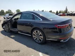 ✅ 2022 Audi A8 • VIN: WAULDAF86NN001617 • Лот: 63068504. Опубликован ранее на Copart с пробегом 25 974 миль. Бесплатный доступ к архиву аукционных продаж из США и подробный отчёт об истории автомобиля на DreamBid. Изображение 2.