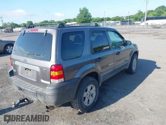 ✅ 2006 Ford Escape XLT • VIN: 1FMYU93116KA07662 • Lot: 42372284. Listed on IAAI with 206,831 mi. Free auction sales archive from the USA and detailed vehicle history report at DreamBid. Image 4.