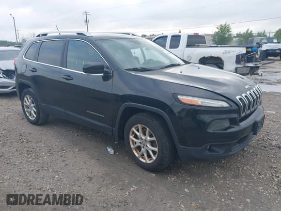 ✅ 2014 Jeep Cherokee Altitude • VIN: 1C4PJMCS4EW297696 • Lot: 42459285. Listed on IAAI with 196,772 mi. Free auction sales archive from the USA and detailed vehicle history report at DreamBid. Image 1.