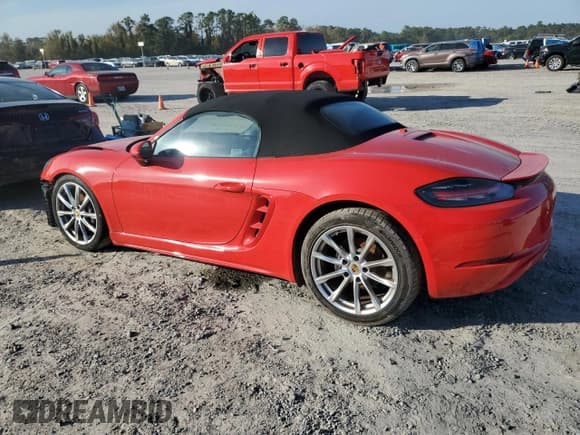 ✅ 2023 Porsche 718 Boxster • VIN: WP0CA2A88PS205347 • Лот: 82892374. Опубликован ранее на Copart с пробегом 6 851 миль. Бесплатный доступ к архиву аукционных продаж из США и подробный отчёт об истории автомобиля на DreamBid. Изображение 2.
