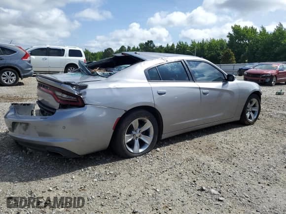 ✅ 2015 Dodge Charger SE • VIN: 2C3CDXBG9FH806061 • Lot: 60776125. Listed on Copart with 184,661 mi. Free auction sales archive from the USA and detailed vehicle history report at DreamBid. Image 3.