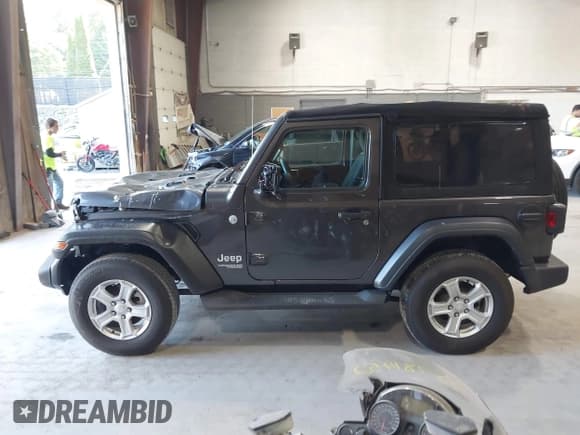 ✅ 2020 Jeep Wrangler Sport S • VIN: 1C4GJXAN6LW157127 • Lot: 43132606. Listed on IAAI with 14,778 mi. Free auction sales archive from the USA and detailed vehicle history report at DreamBid. Image 14.