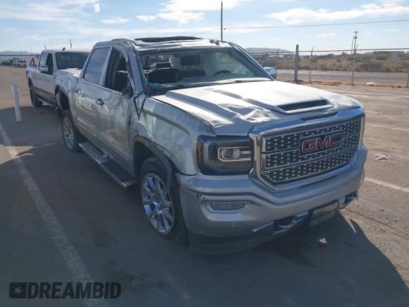✅ 2017 GMC Sierra 1500 Denali • VIN: 3GTU2PEC2HG437299 • Lot: 43609455. Listed on IAAI with Not provided. Free auction sales archive from the USA and detailed vehicle history report at DreamBid. Image 1.