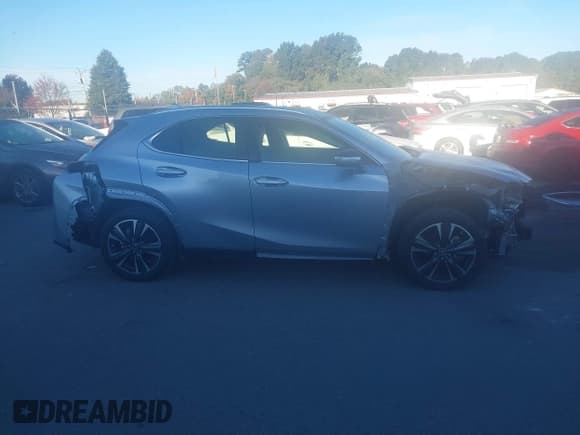 ✅ 2023 Lexus UX 250h Premium • VIN: JTHP6JBH7P2148102 • Lot: 43488041. Wystawiony na IAAI z przebiegiem 21 340 mil. Bezpłatny archiwum sprzedaży aukcyjnych z USA i szczegółowy raport historii pojazdu na DreamBid. Zdjęcie 14.