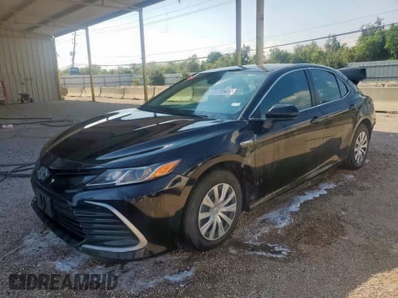 2021 Toyota Camry Hybrid LE с VIN 4T1C31AK1MU022481, выставлен на аукционе Copart как лот 80663205 с пробегом 98 591 миль миль и Чистый • Clean title. История ставок и продаж доступна на DreamBid. Изображение 1.