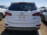 ✅ 2018 Hyundai Santa Fe Ultimate • VIN: 5NMZWDLA8JH100799 • Лот: 52395294. Опубликован ранее на Copart с пробегом 50 335 миль. Бесплатный доступ к архиву аукционных продаж из США и подробный отчёт об истории автомобиля на DreamBid. Изображение 6.