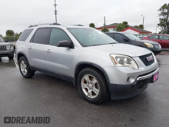 ✅ 2011 GMC Acadia SL • VIN: 1GKKVNED6BJ220506 • Lot: 41393659. Listed on IAAI with 133,977 mi. Free auction sales archive from the USA and detailed vehicle history report at DreamBid. Image 1.