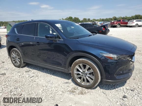 ✅ 2019 Mazda CX-5 Signature • VIN: JM3KFBEY5K0586626 • Lot: 80845515. Listed on Copart with 50,623 mi. Free auction sales archive from the USA and detailed vehicle history report at DreamBid. Image 4.