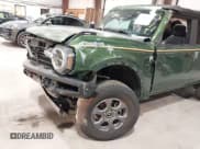 ✅ 2023 Ford Bronco • VIN: 1FMDE5BH8PLB29322 • Lot: 42334845. Listed on IAAI with 28,352 mi. Free auction sales archive from the USA and detailed vehicle history report at DreamBid. Image 6.