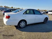✅ 2006 Toyota Camry LE • VIN: 4T1BE32K76U706437 • Lot: 93868095. Listed on Copart with 153,643 mi. Free auction sales archive from the USA and detailed vehicle history report at DreamBid. Image 3.
