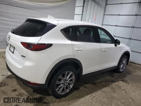 ✅ 2019 Mazda CX-5 Grand Touring • VIN: JM3KFBDM1K1557763 • Lot: 82165255. Listed on Copart with 74,330 mi. Free auction sales archive from the USA and detailed vehicle history report at DreamBid. Image 3.