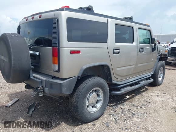 ✅ 2003 Hummer H2 • VIN: 5GRGN23U83H123964 • Лот: 42682435. Опубликован ранее на IAAI с пробегом 137 171 миль. Бесплатный доступ к архиву аукционных продаж из США и подробный отчёт об истории автомобиля на DreamBid. Изображение 4.