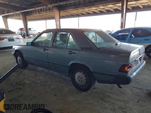 ✅ 1985 Mercedes-Benz 190 • VIN: WDBDA24C7FF096163 • Lot: 83237794. Listed on Copart with 231,046 mi. Free auction sales archive from the USA and detailed vehicle history report at DreamBid. Image 2.