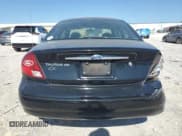 ✅ 2003 Ford Taurus SE Standard • VIN: 1FAFP53U93G179724 • Lot: 84913265. Wystawiony na Copart z przebiegiem 92 731 mil. Bezpłatny archiwum sprzedaży aukcyjnych z USA i szczegółowy raport historii pojazdu na DreamBid. Zdjęcie 6.