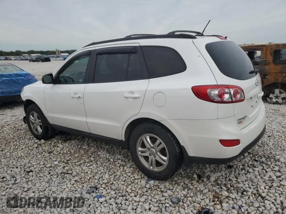 ✅ 2012 Hyundai Santa Fe GLS • VIN: 5XYZGDAB2CG151401 • Lot: 72714994. Listed on Copart with 123,518 mi. Free auction sales archive from the USA and detailed vehicle history report at DreamBid. Image 2.