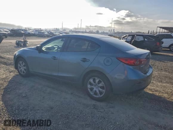 ✅ 2014 Mazda 3 i Sport • VIN: JM1BM1U71E1133412 • Lot: 94716165. Listed on Copart with 179,986 mi. Free auction sales archive from the USA and detailed vehicle history report at DreamBid. Image 2.