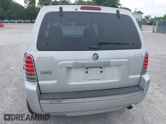 2006 Mercury Mariner Luxury with VIN 4M2YU57106KJ15112, listed as a IAAI auction lot 42815311 with 44,859 mi miles and . Bid and sale history available at DreamBid. Image 6.