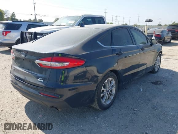 ✅ 2020 Ford Fusion SE • VIN: 3FA6P0HD5LR233685 • Lot: 43414117. Listed on IAAI with 80,295 mi. Free auction sales archive from the USA and detailed vehicle history report at DreamBid. Image 4.