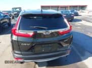 ✅ 2018 Honda CR-V Touring • VIN: 7FARW2H90JE052921 • Lot: 43671364. Listed on IAAI with 101,261 mi. Free auction sales archive from the USA and detailed vehicle history report at DreamBid. Image 15.