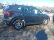 ✅ 2015 Mazda CX-5 Sport • VIN: JM3KE4BY6F0499357 • Lot: 43817789. Listed on IAAI with 155,042 mi. Free auction sales archive from the USA and detailed vehicle history report at DreamBid. Image 4.