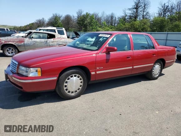 ✅ 1999 Cadillac DeVille • VIN: 1G6KD54Y7XU723747 • Lot: 59883975. Listed on Copart with 82,049 mi. Free auction sales archive from the USA and detailed vehicle history report at DreamBid. Image 1.