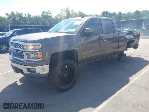 2015 Chevrolet Silverado 1500 LT z VIN 1GCVKREC6FZ161108, wystawiony jako IAAI lot #43074690 z przebiegiem 198 960 mil mil oraz . Historia ofert i sprzedaży dostępna na DreamBid. Obrazek 2.