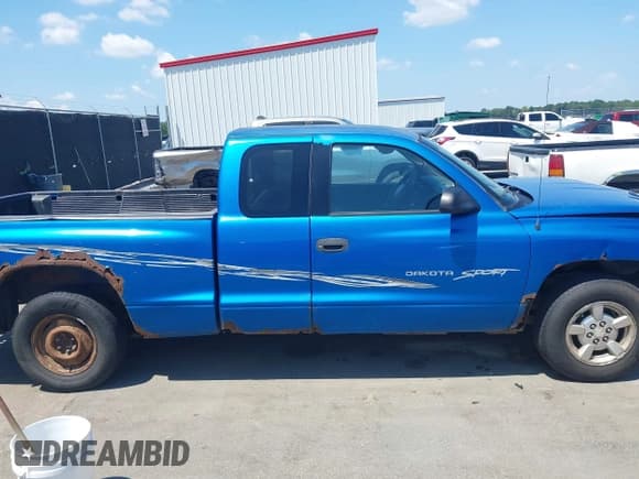 ✅ 2001 Dodge Dakota • VIN: 1B7GL22X81S136040 • Lot: 42771127. Wystawiony na IAAI z przebiegiem Nie podano. Bezpłatny archiwum sprzedaży aukcyjnych z USA i szczegółowy raport historii pojazdu na DreamBid. Zdjęcie 14.