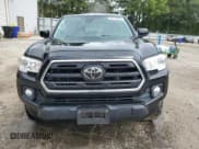 ✅ 2019 Toyota Tacoma SR • VIN: 5TFAX5GN2KX142794 • Лот: 85178955. Опубликован ранее на Copart с пробегом 88 341 миль. Бесплатный доступ к архиву аукционных продаж из США и подробный отчёт об истории автомобиля на DreamBid. Изображение 5.