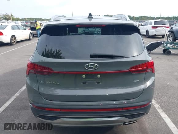✅ 2021 Hyundai Santa Fe SEL • VIN: 5NMS3DAJ9MH318767 • Lot: 43327611. Listed on IAAI with 82,332 mi. Free auction sales archive from the USA and detailed vehicle history report at DreamBid. Image 16.